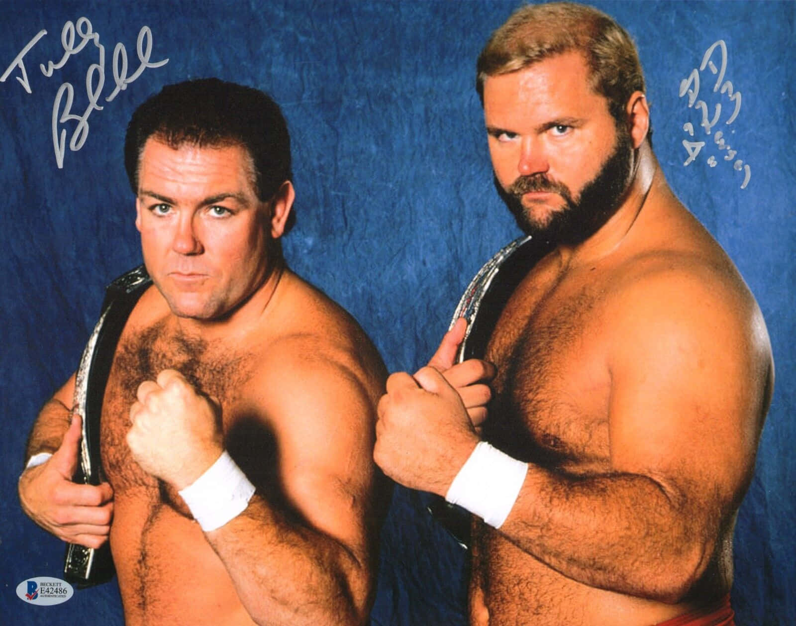 Legendary Wrestler, Arn Anderson, And Tully Blanchard Posing During An Autograph Signing Session.