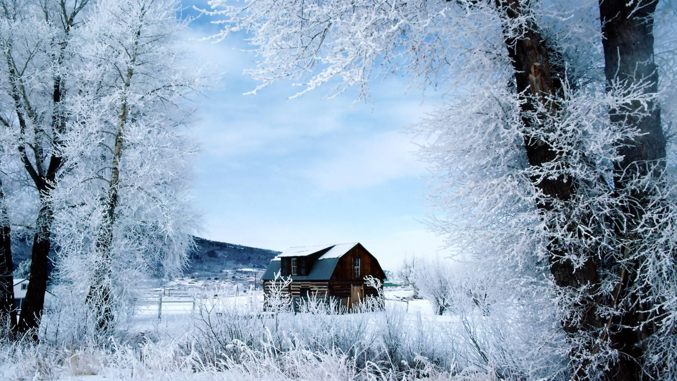 1366 X 768 Winter Cabin In Forest Wallpaper