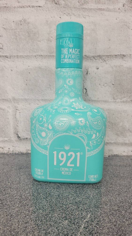 1921 Tequila Azul Maya Bottle Brick Wall Wallpaper