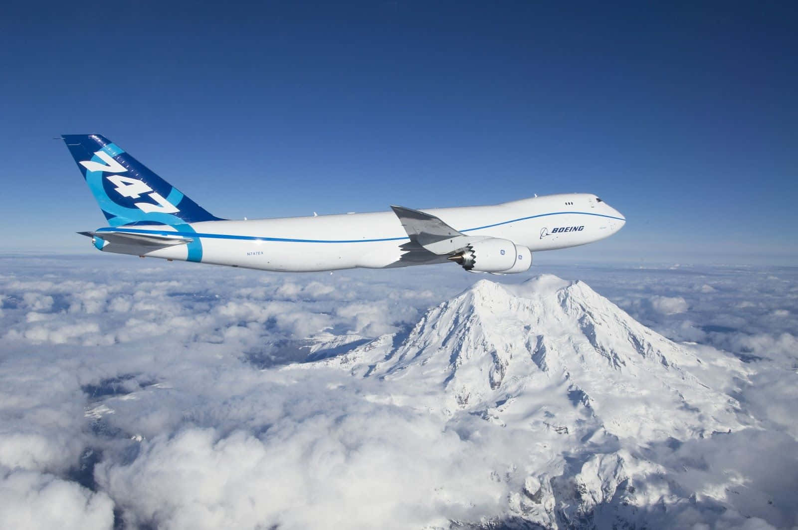 747 Airplane Over Ridges Wallpaper