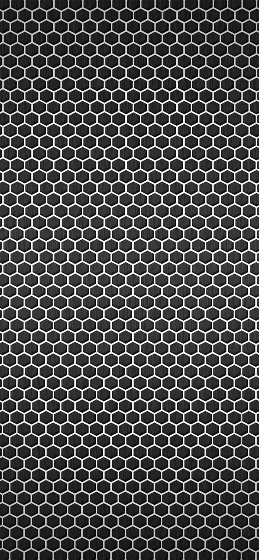 A Black And White Hexagonal Pattern On A Black Background Wallpaper