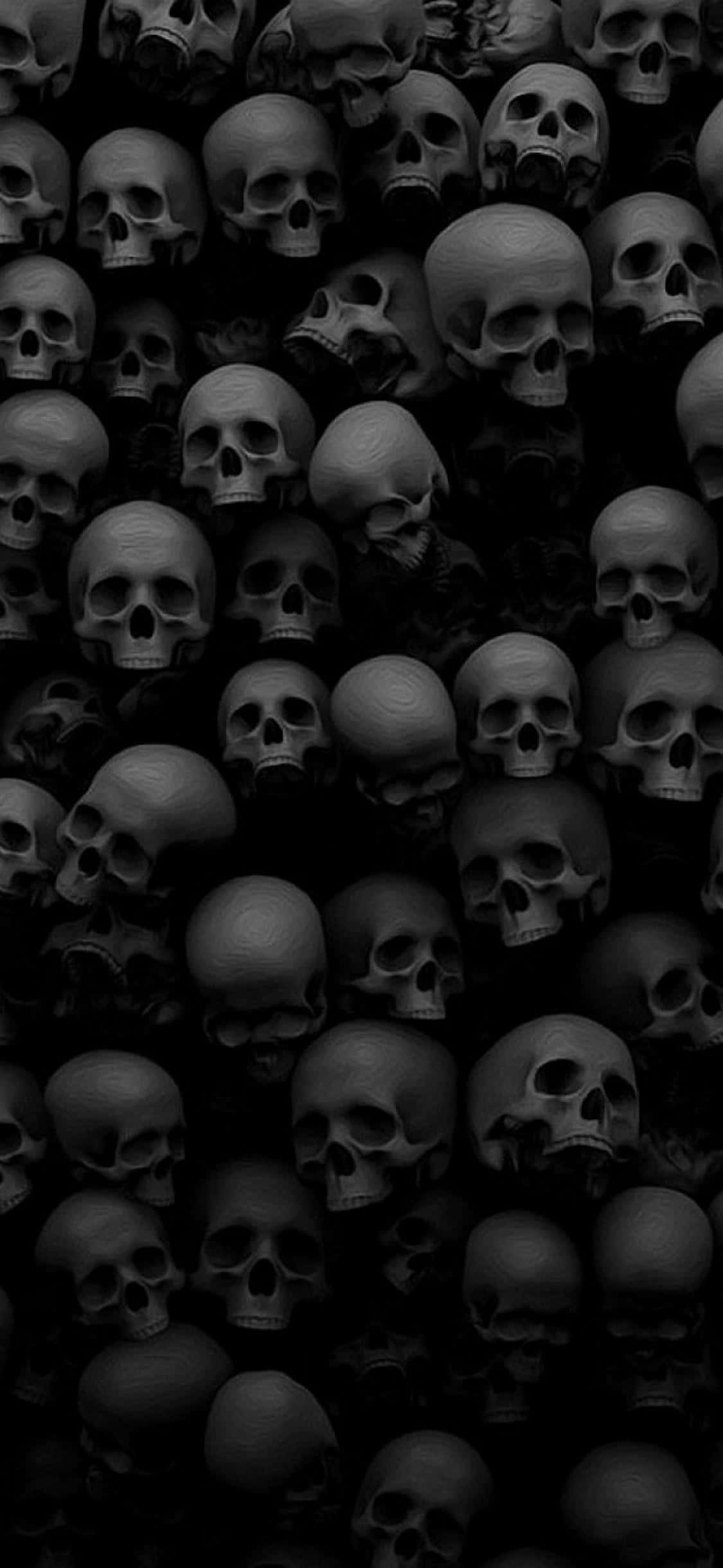 A Black Background With Many Skulls In It Wallpaper