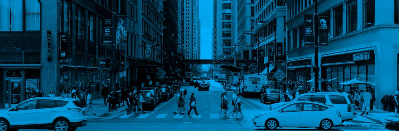 A Blue Background With People Walking Down A Street Wallpaper