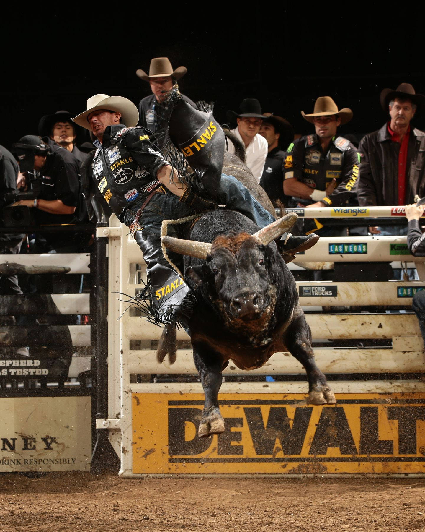 A Bull Rider Is Bucking A Bull Wallpaper