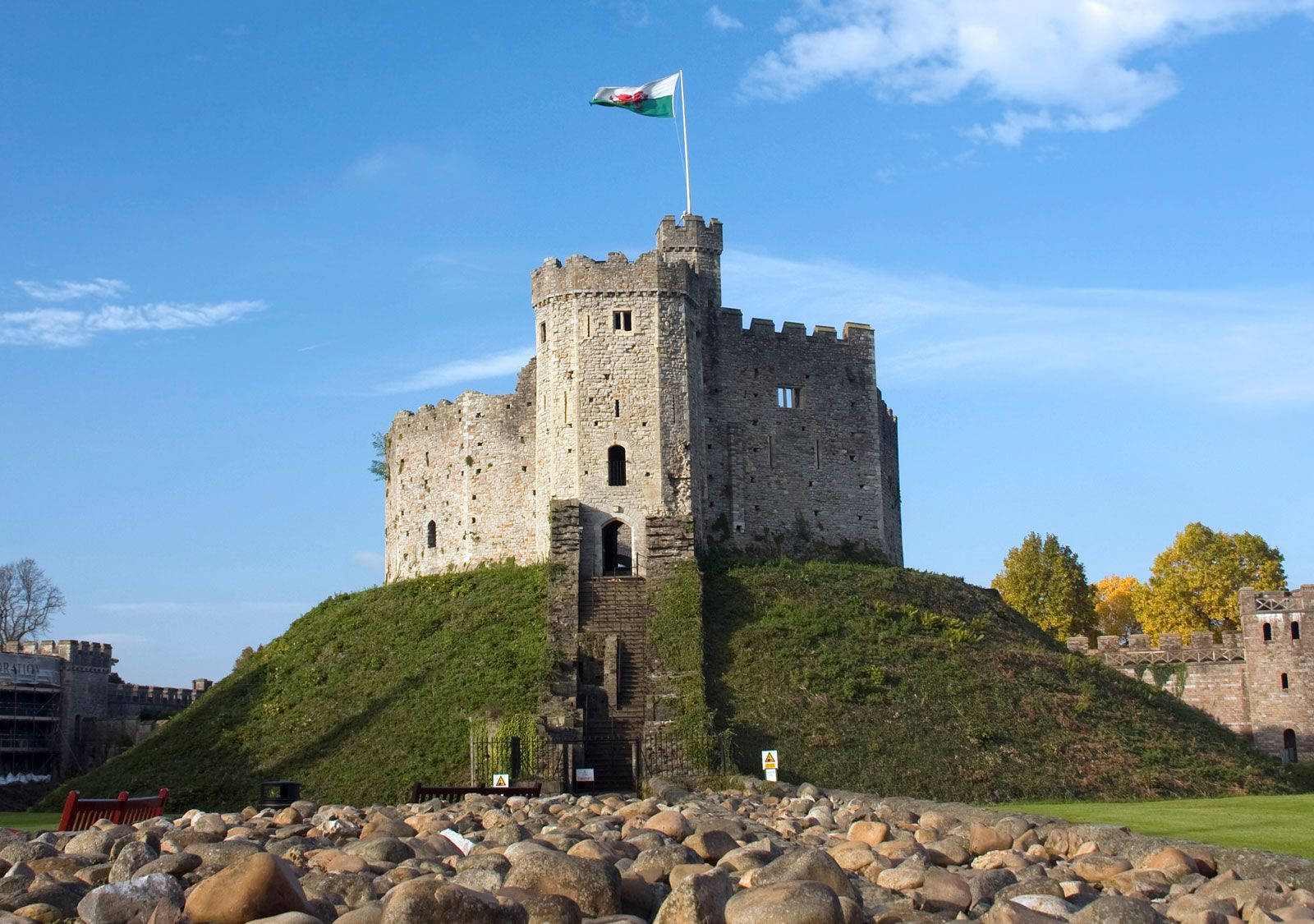 A Castle With A Flag On Top Of It Wallpaper