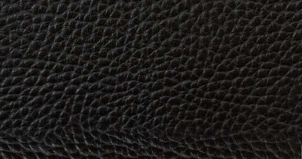 A Close Up Of A Black Leather Surface Wallpaper
