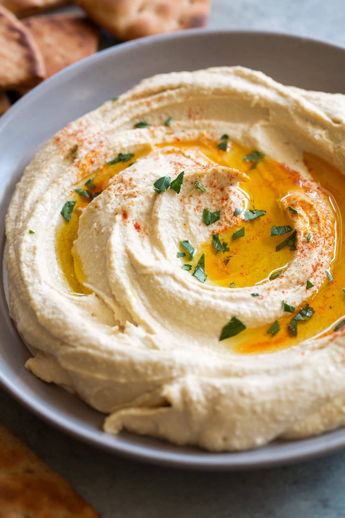 A Delicious Bowl Of Creamy Hummus Drizzled With Olive Oil Wallpaper