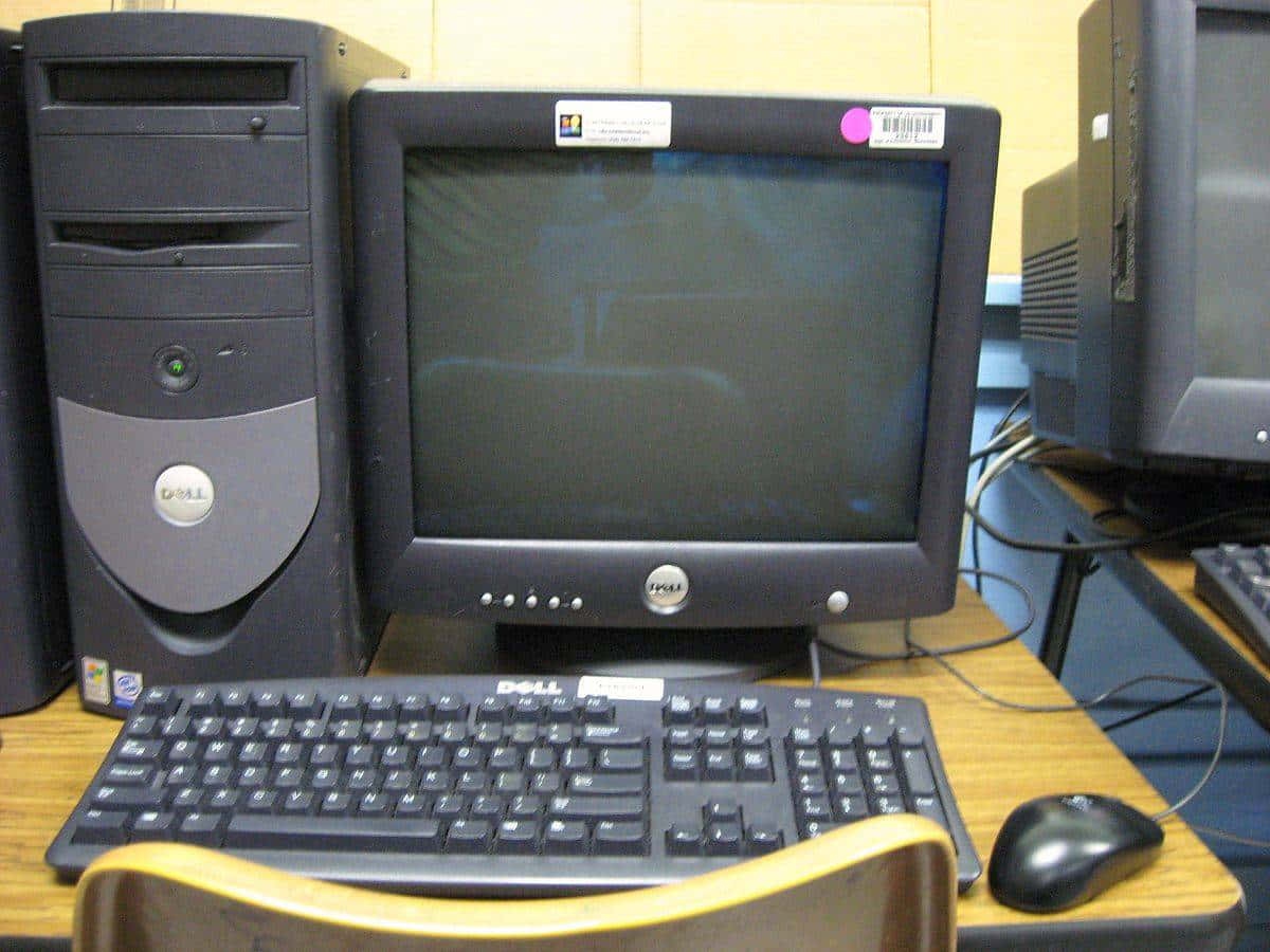 A Desk With A Computer Wallpaper