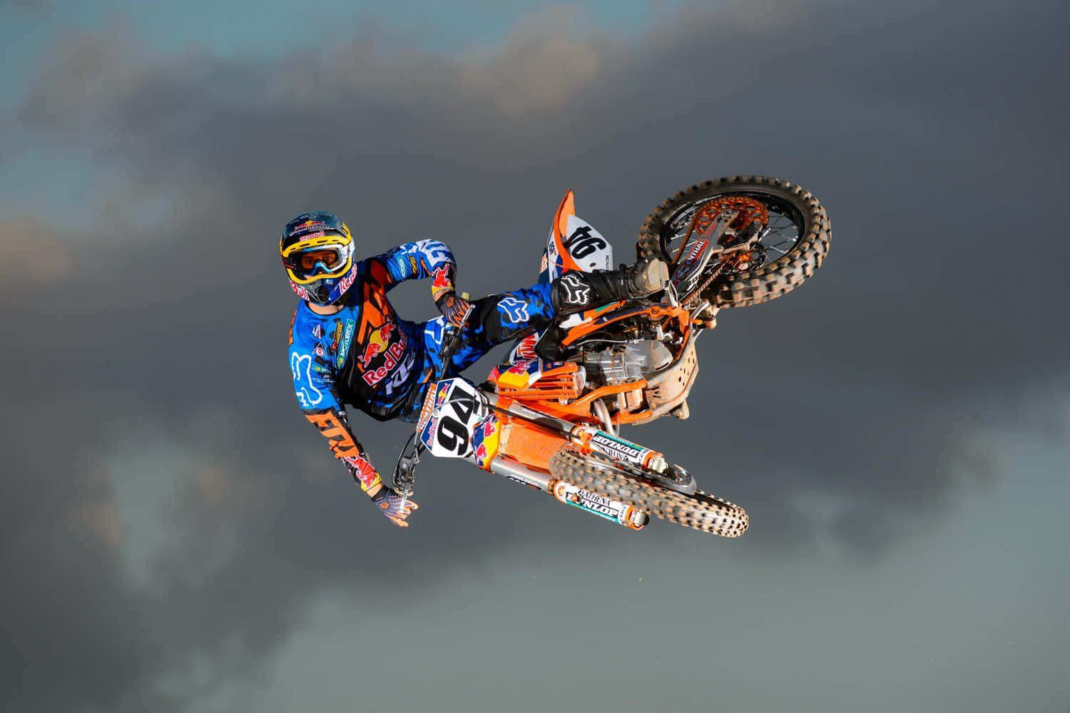 A Dirt Bike Rider In The Air Wallpaper