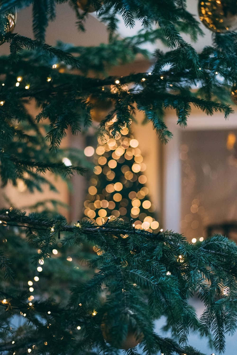 A Festive Christmas Tree Ornament For The Holiday Season. Wallpaper