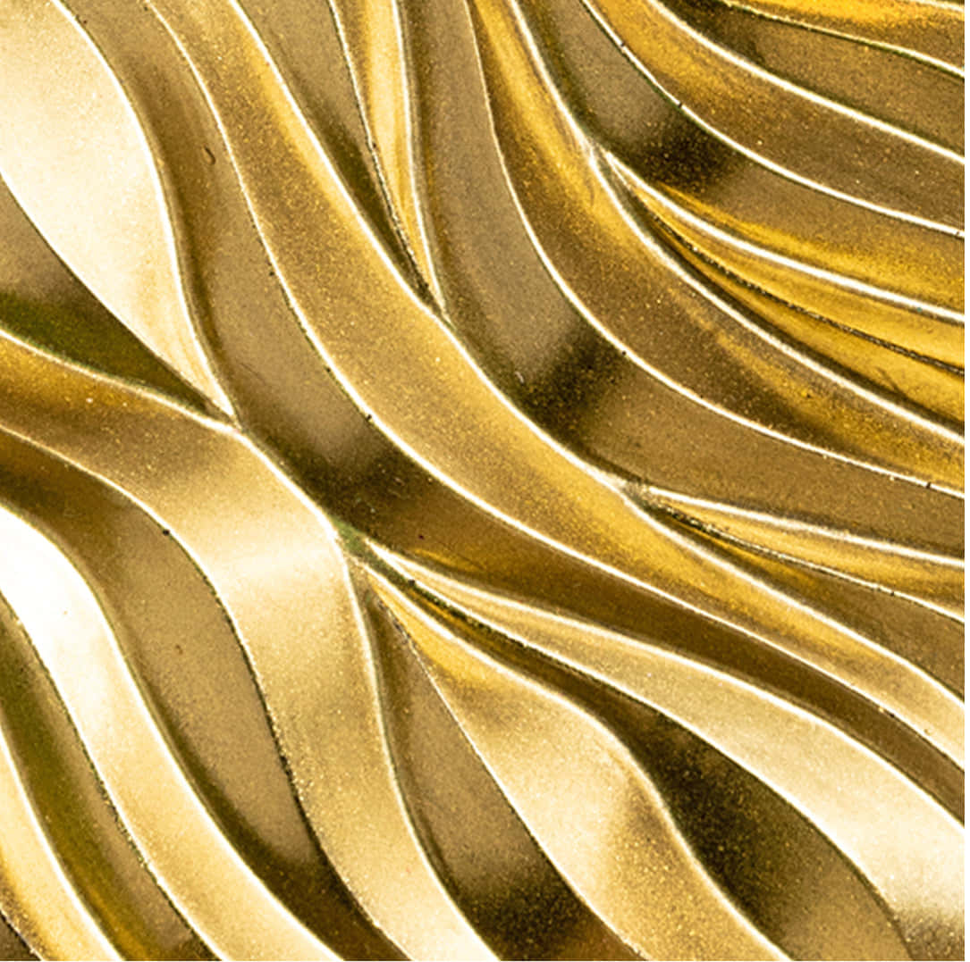 A Gold Wavy Pattern On A Background Wallpaper