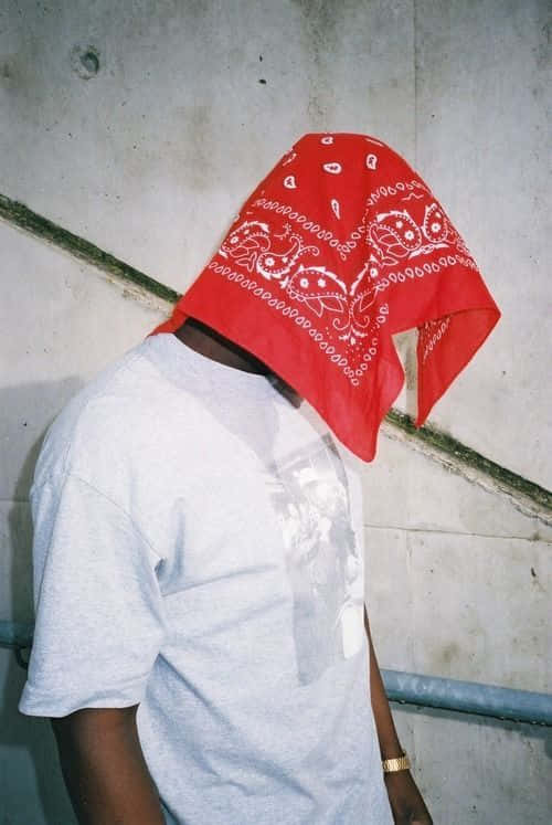 A Man Wearing A Red Bandana With A T Shirt Wallpaper