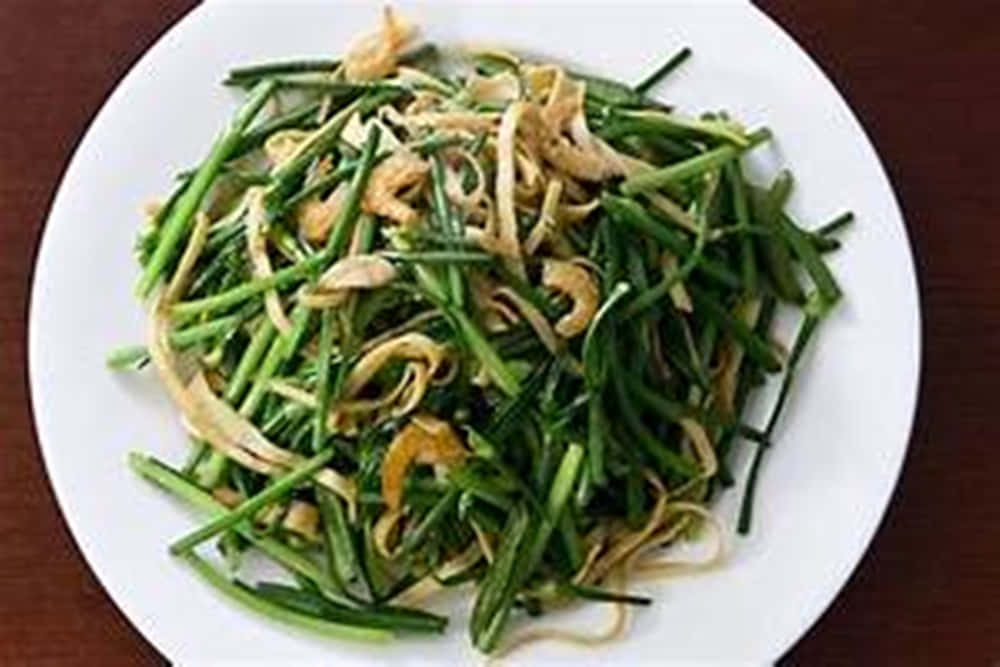 A Mouth-watering Stir-fry Of Chives And Bean Sprouts Wallpaper