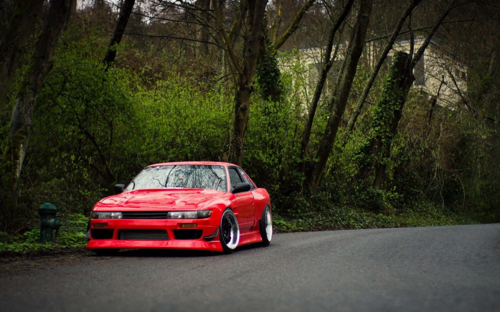 A Nissan Silvia S13 Sitting On A Track In The Twilight Wallpaper