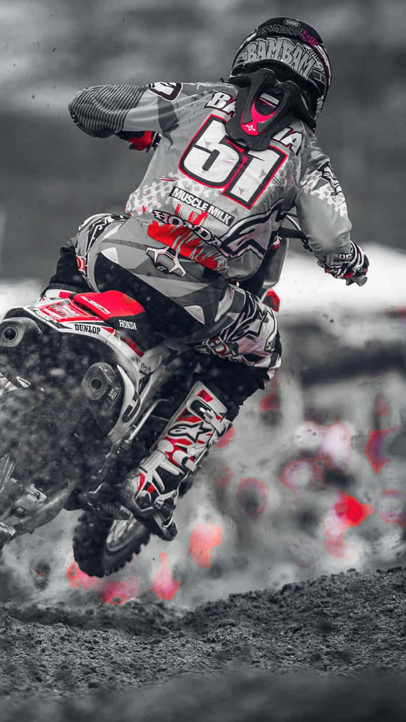 A Person Riding A Dirt Bike Wallpaper