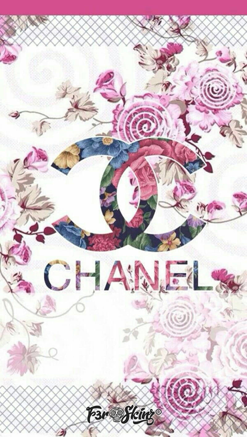 A Pink-colored Logo Of The Luxurious Fashion Brand, Chanel. Wallpaper