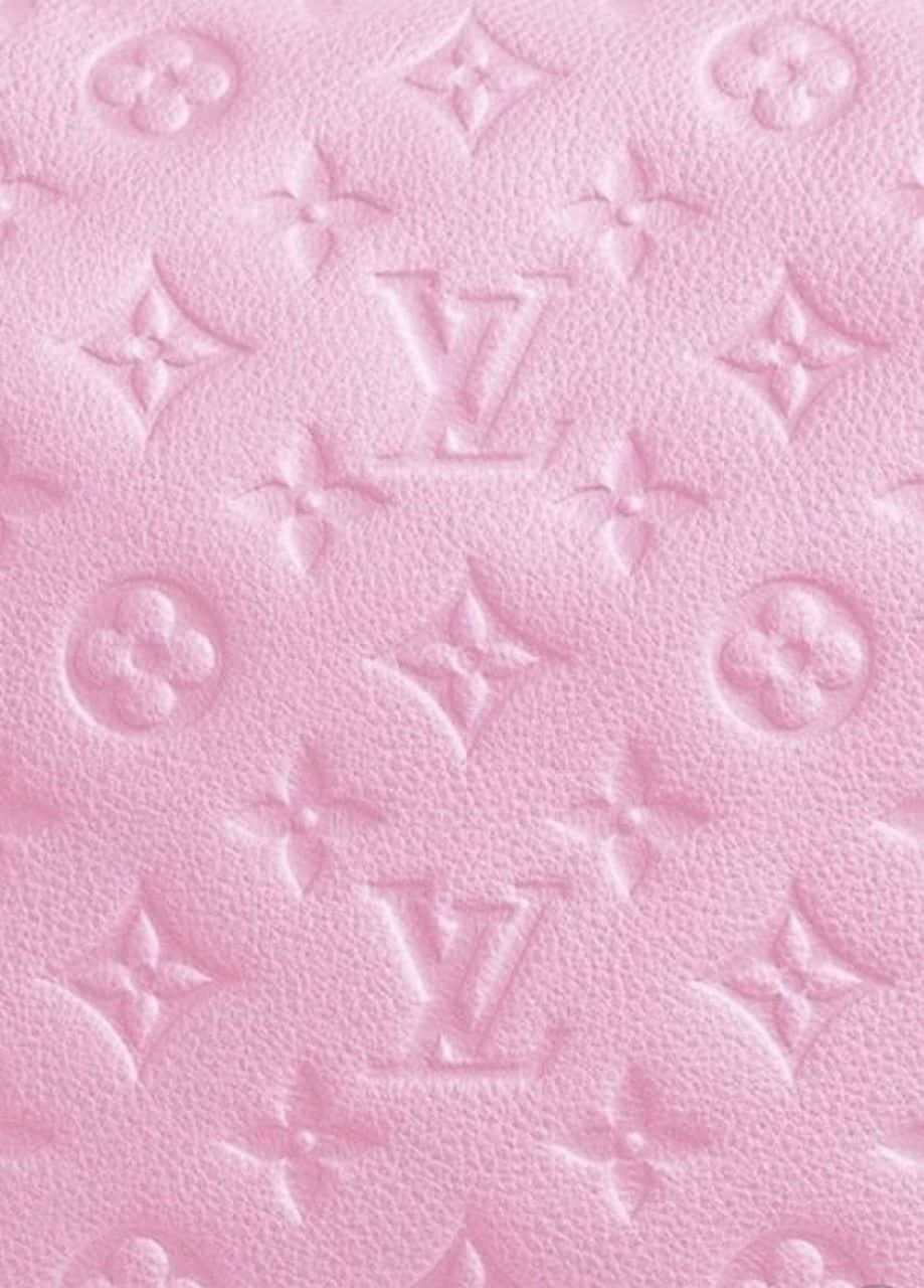 A Pink Louis Vuitton Purse Adding A Pop Of Color To An Outfit. Wallpaper