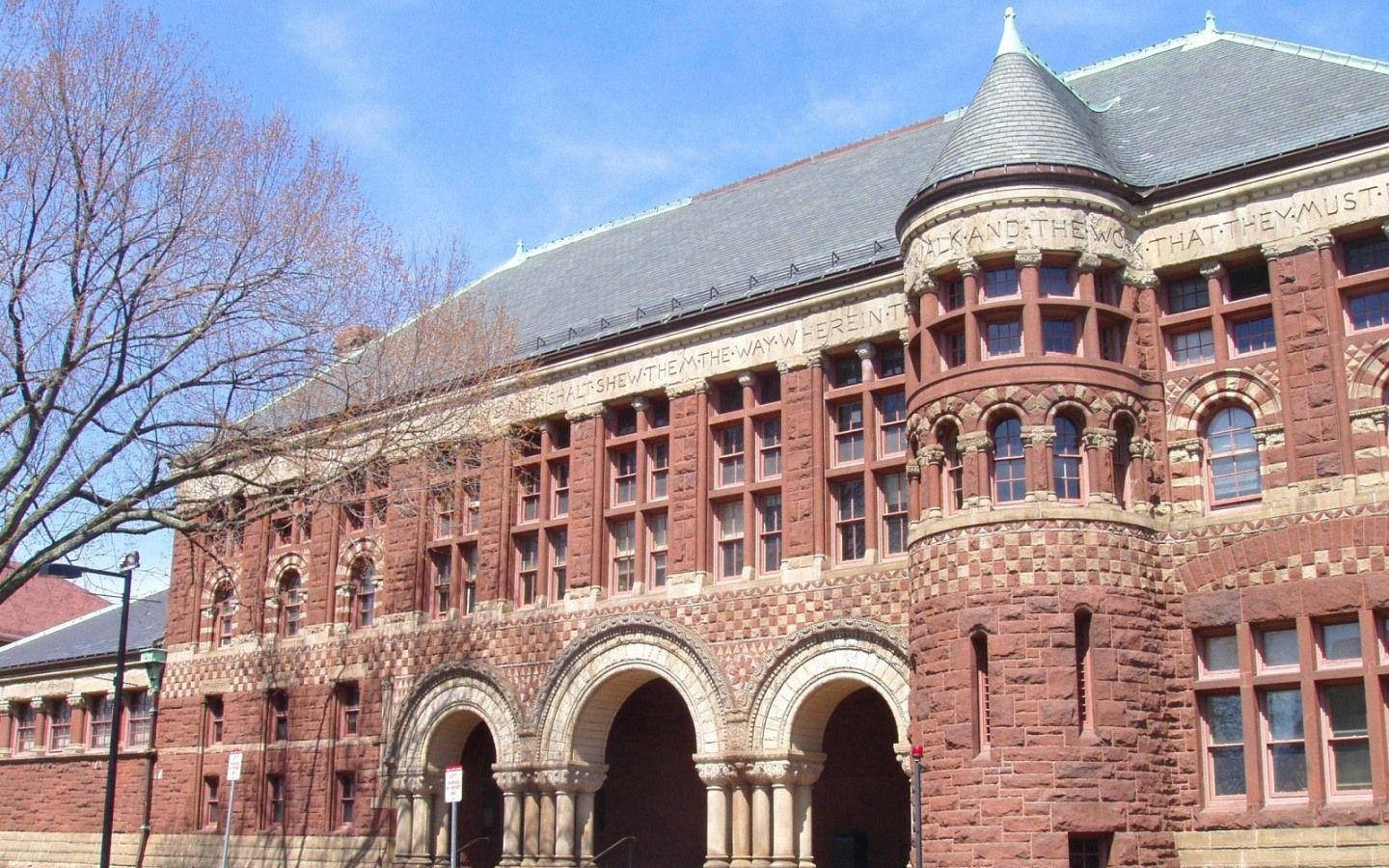 A Pristine View Of Austin Hall At Harvard University During Daytime Wallpaper