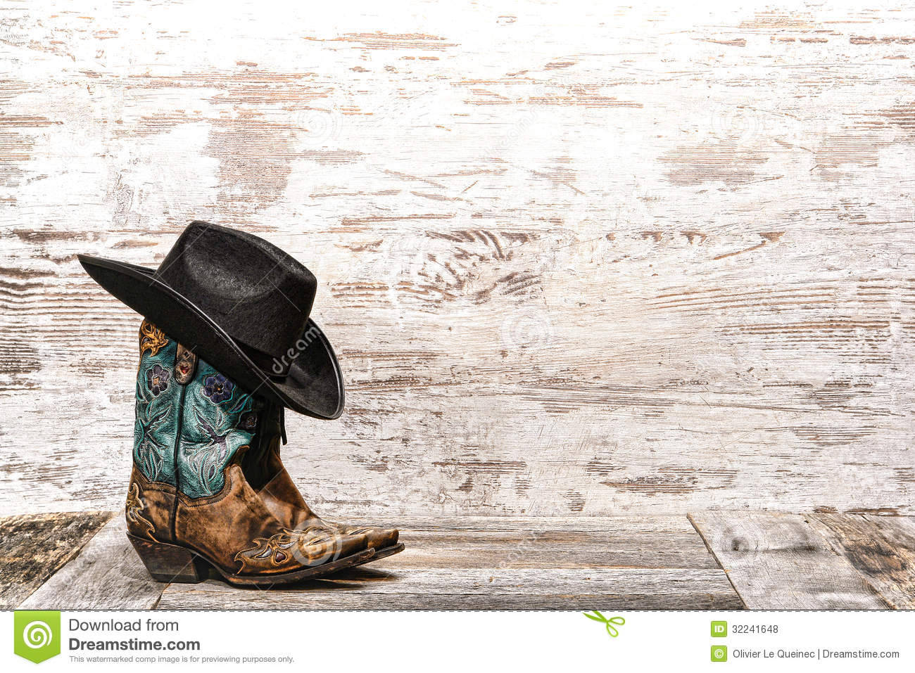 A Rugged American Cowboy Tips His Stetson Cowboy Hat Wallpaper