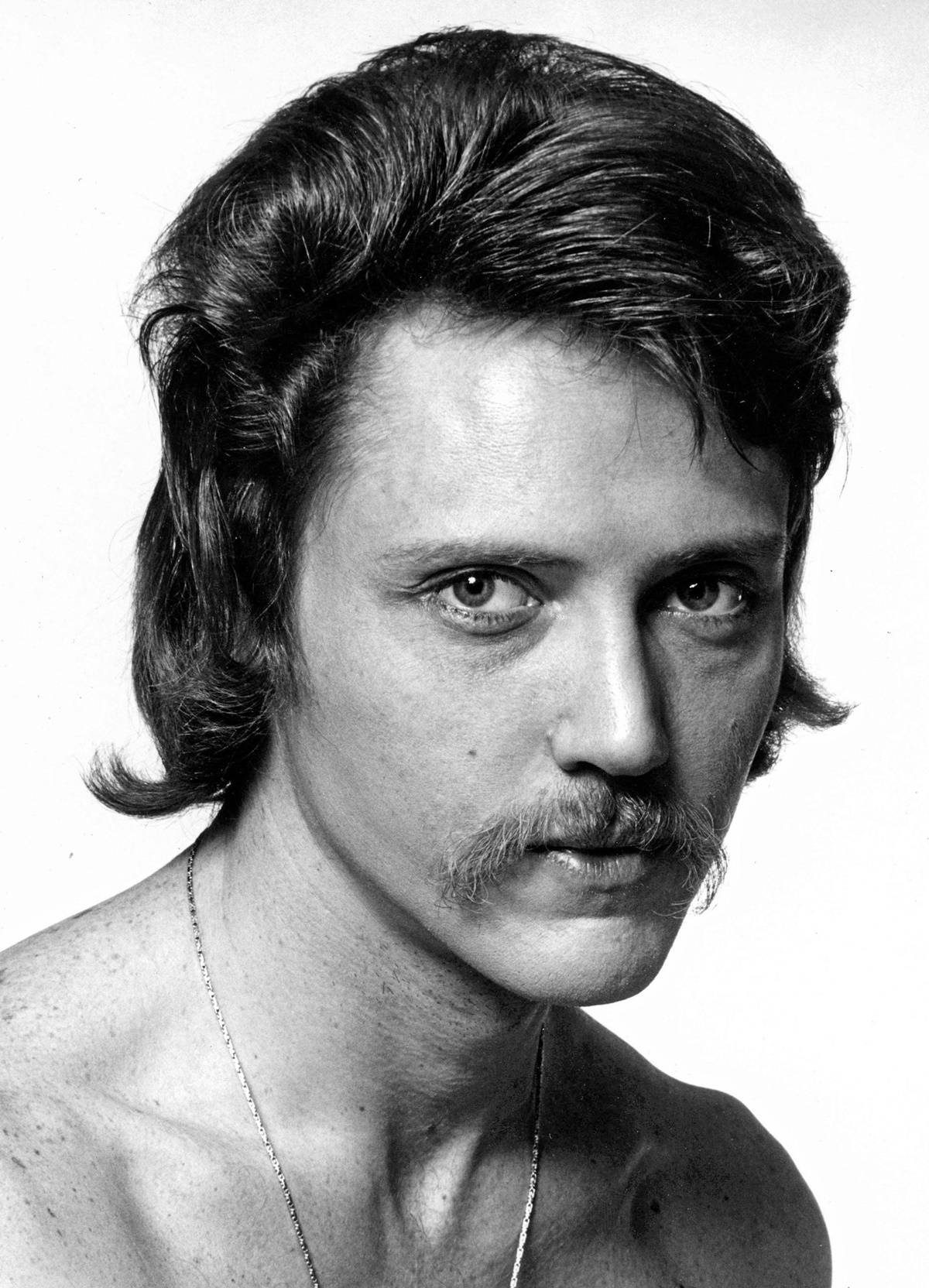 A Striking Black & White Portrait Of Young Christopher Walken Wallpaper