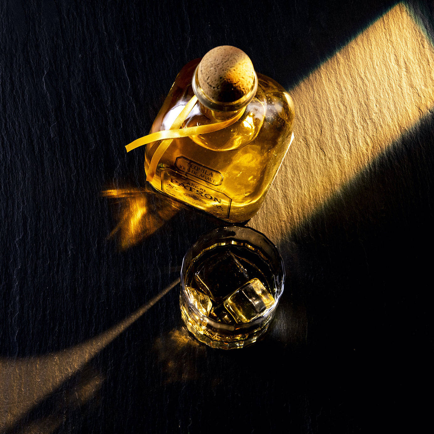 A Top-view Shot Of The Luxurious Deleon Tequila Bottle And Glass Wallpaper