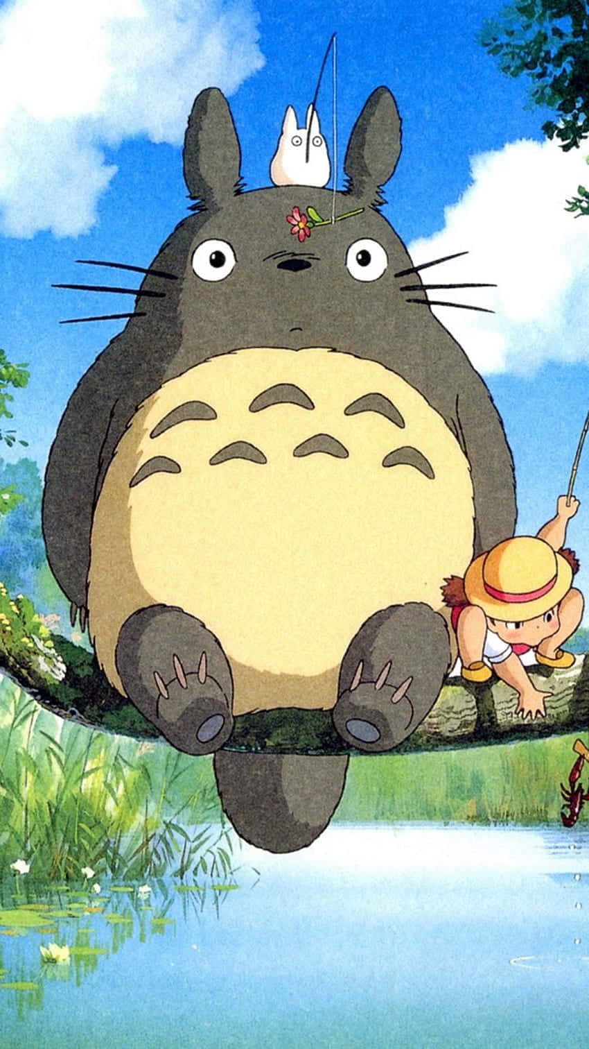 A Totoro And A Girl Sitting On A Branch Wallpaper