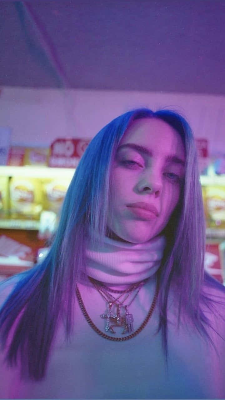 A Vibrant Portrait Of Singer-songwriter Billie Eilish In Purple Wallpaper