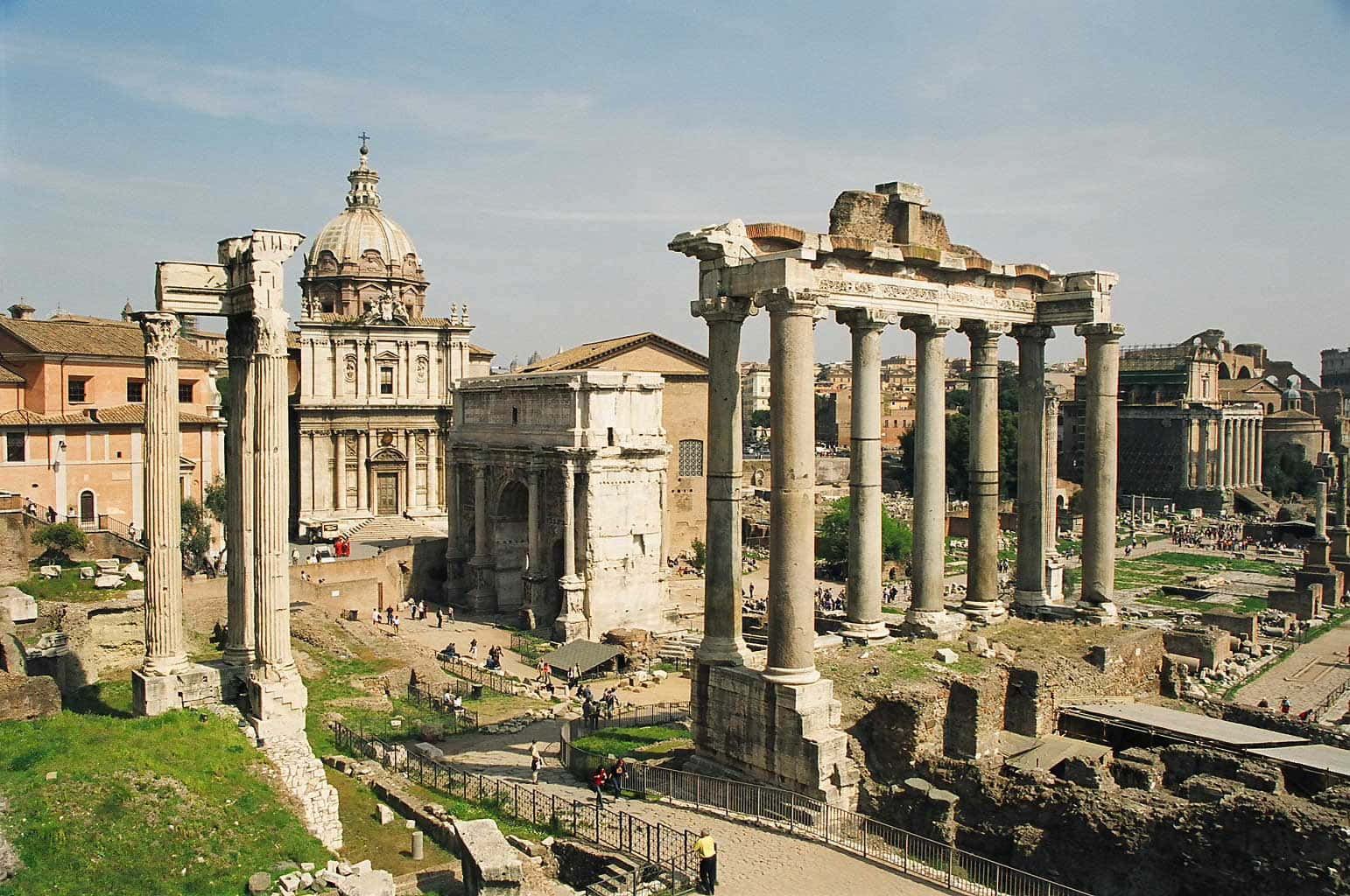 A View Of The Roman Forum With A Lot Of Ruins Wallpaper