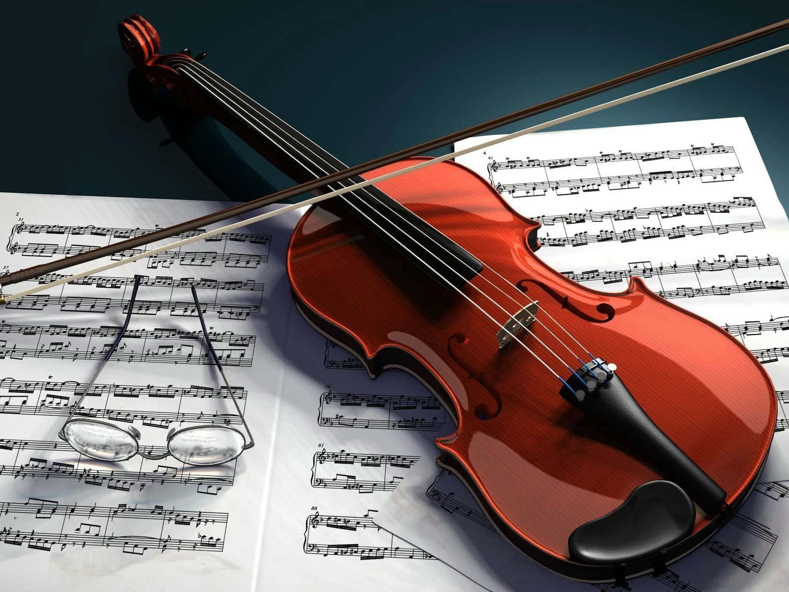 A Violin Resting On Music Sheets Wallpaper