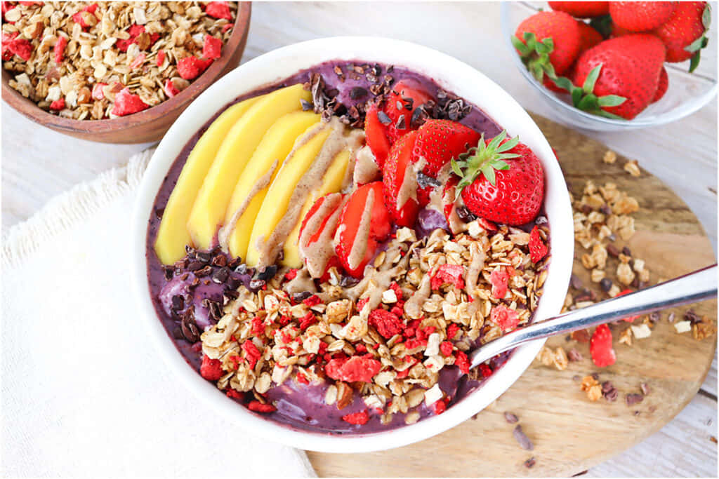 Acai Bowl With Fresh Fruits And Granola Wallpaper