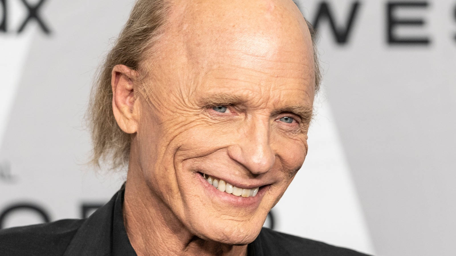 Actor Ed Harris Toothy Grin At Westworld Season 4 Premiere Wallpaper