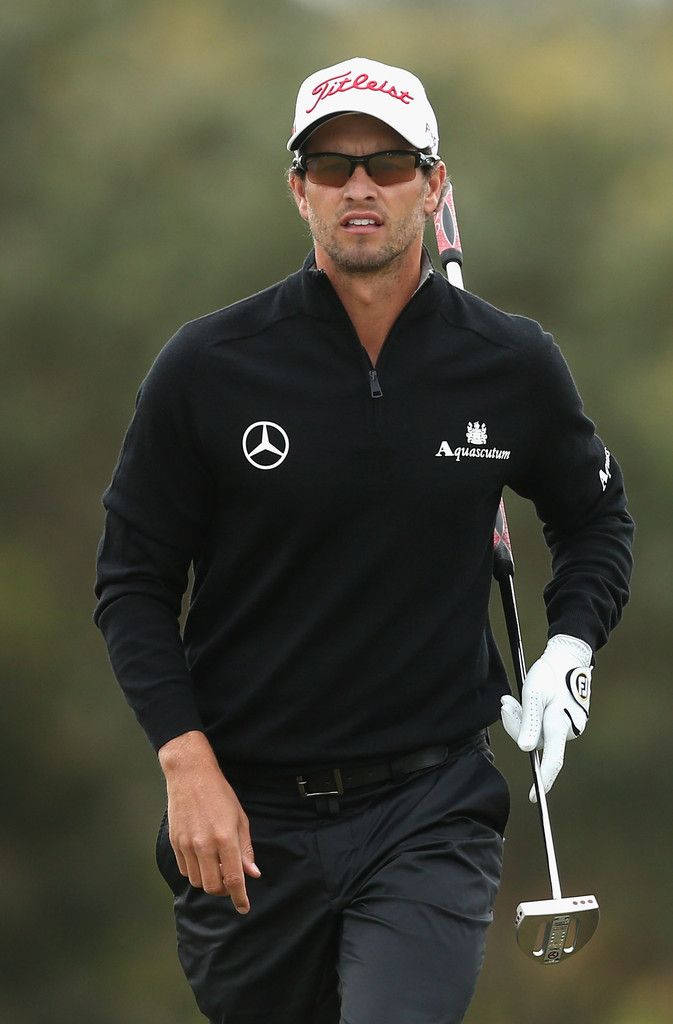 Adam Scott Wearing Jacket With Logo Wallpaper