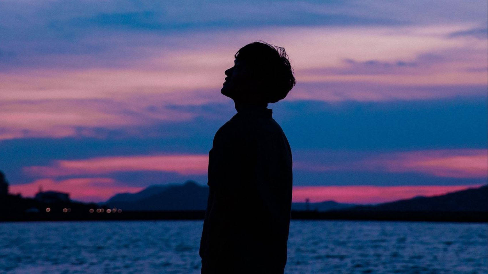 Aesthetic Boy Dreamy Sunset Wallpaper