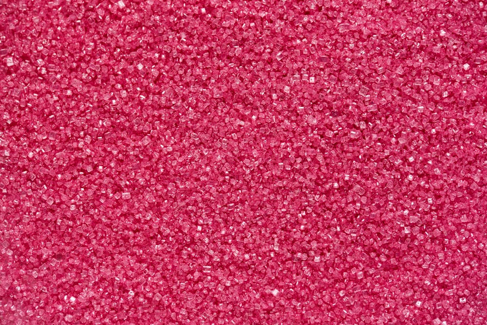 Aesthetic Deep Pink Crystal Beads Sparkling In The Light Wallpaper