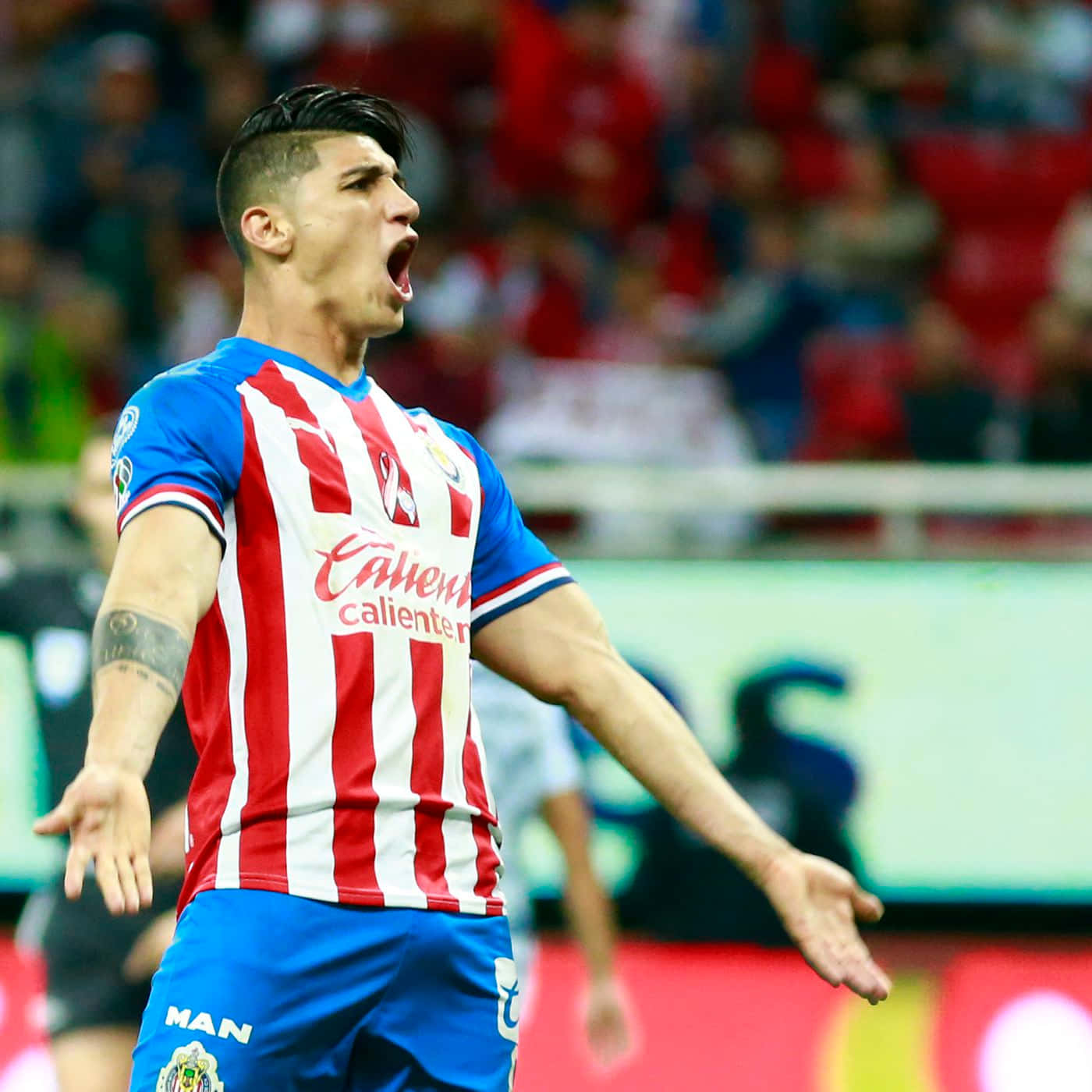 Alan Pulido In Action During His Guadalajara Football Days. Wallpaper