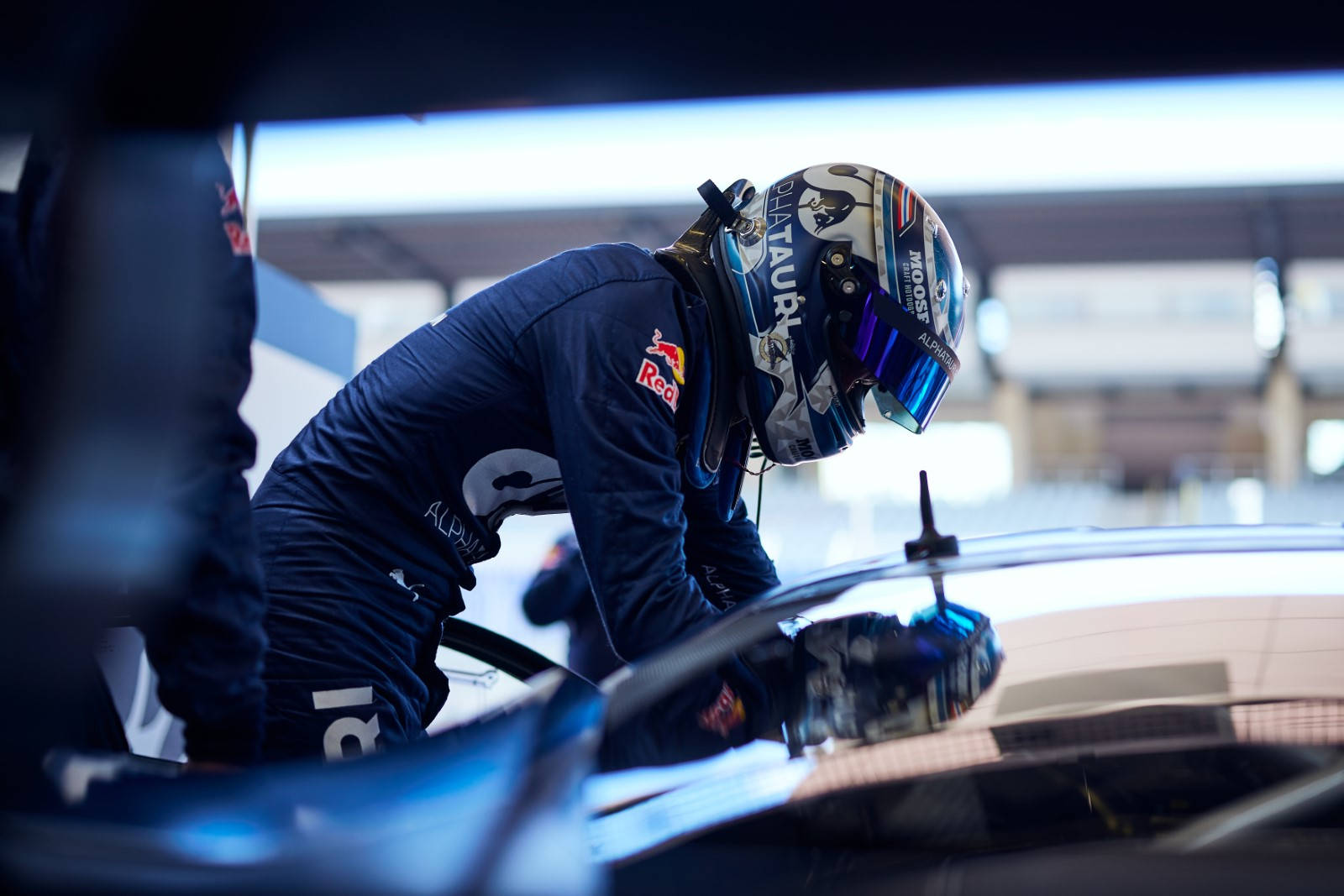 Alexander Albon Leaning On His Racing Car Wallpaper