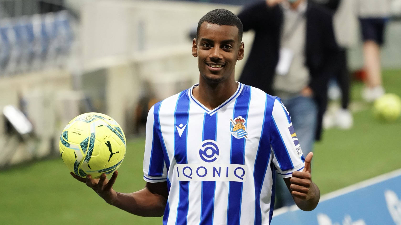 Alexander Isak Holding A Football Wallpaper