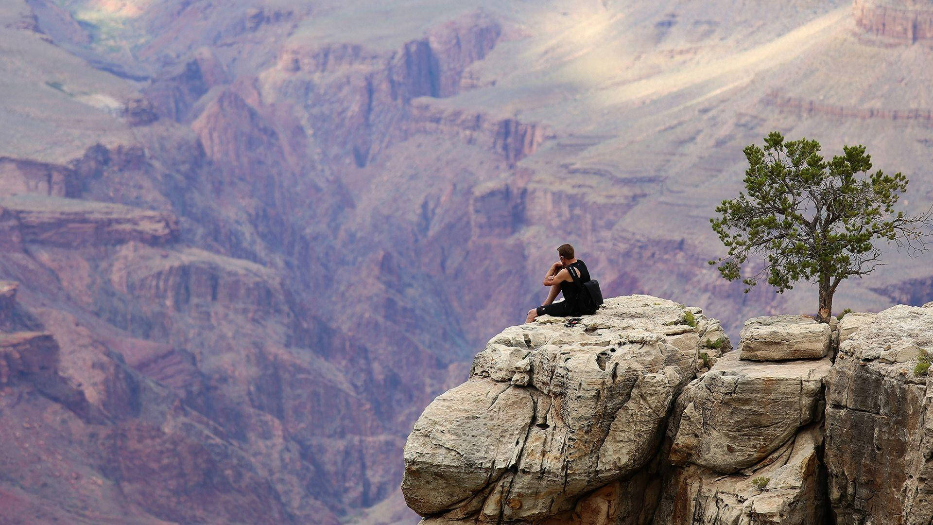 Alone Boy On A Cliff Wallpaper