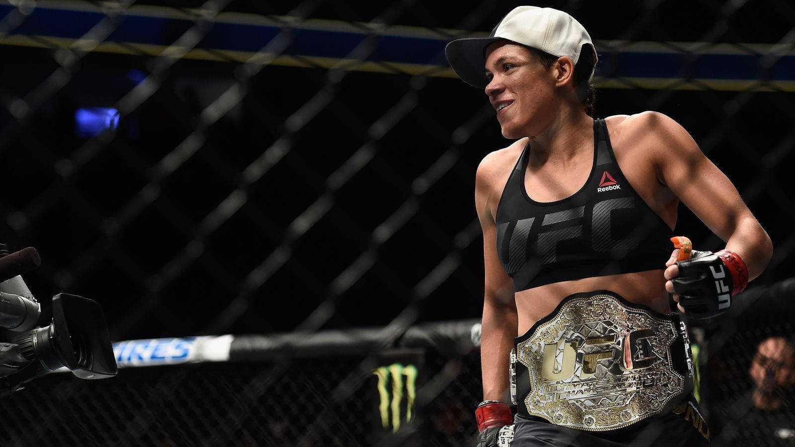 Amanda Nunes With Belt Wallpaper