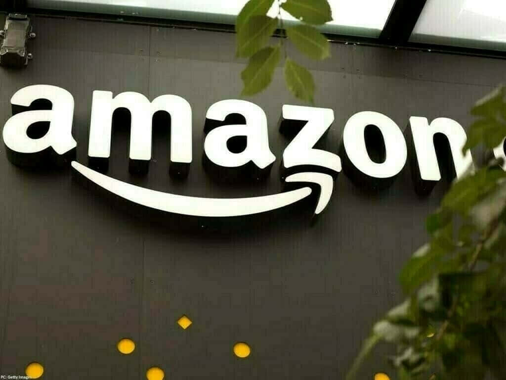 Amazon Uk Logo On Wall Wallpaper