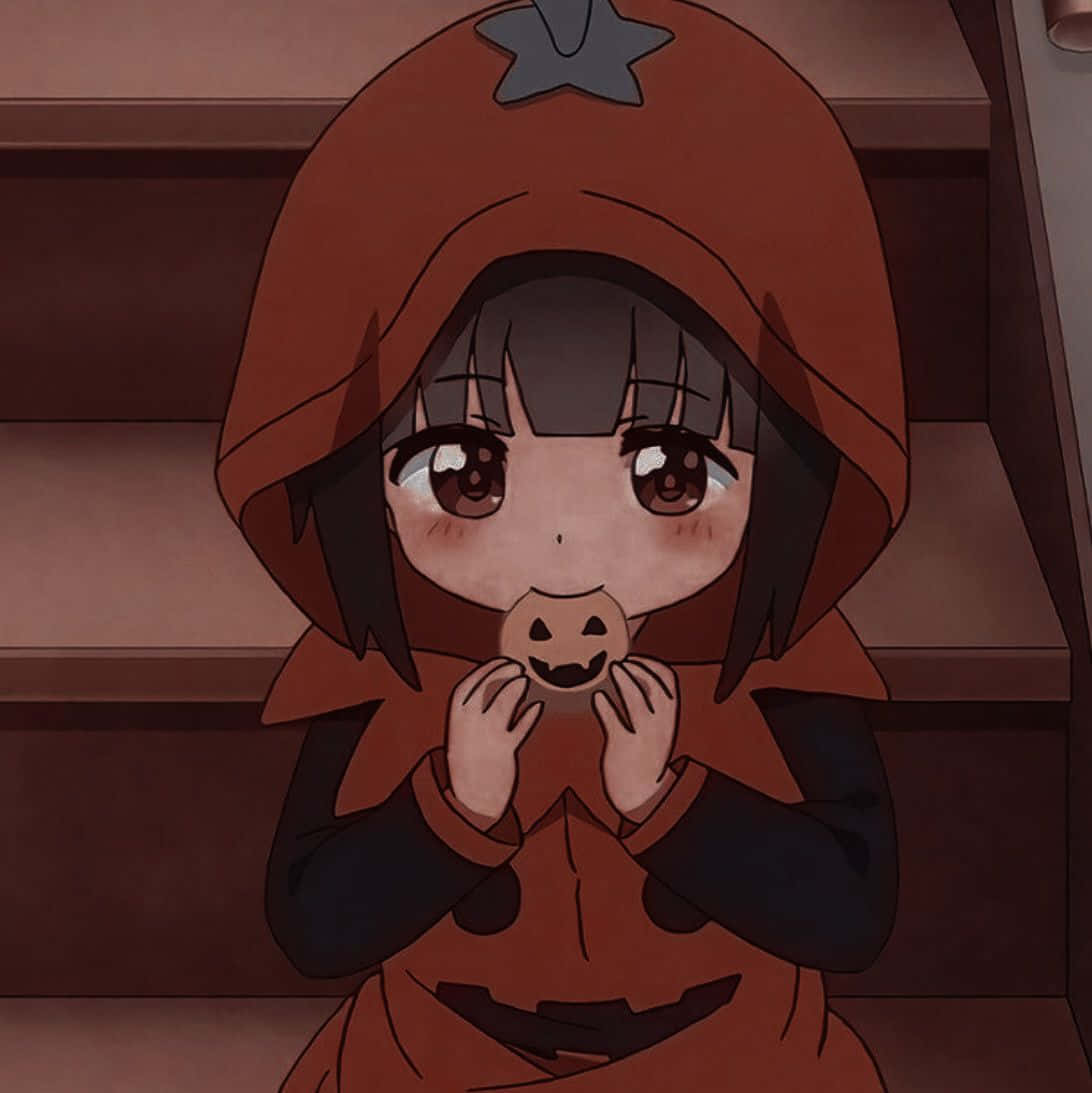 An Anime Girl Dressed In A Spooky Halloween Costume Wallpaper