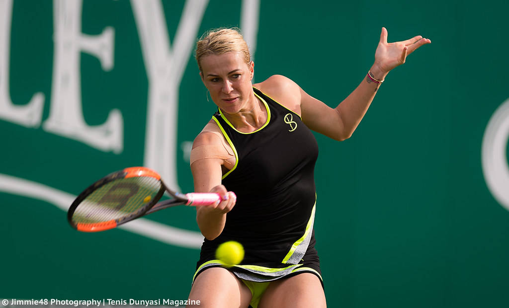 Anastasia Pavlyuchenkova In Action During A Tennis Match. Wallpaper