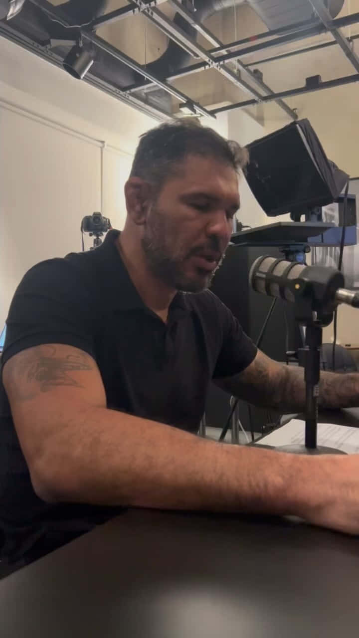 Antônio Rodrigo Nogueira Speaking On Mic Wallpaper