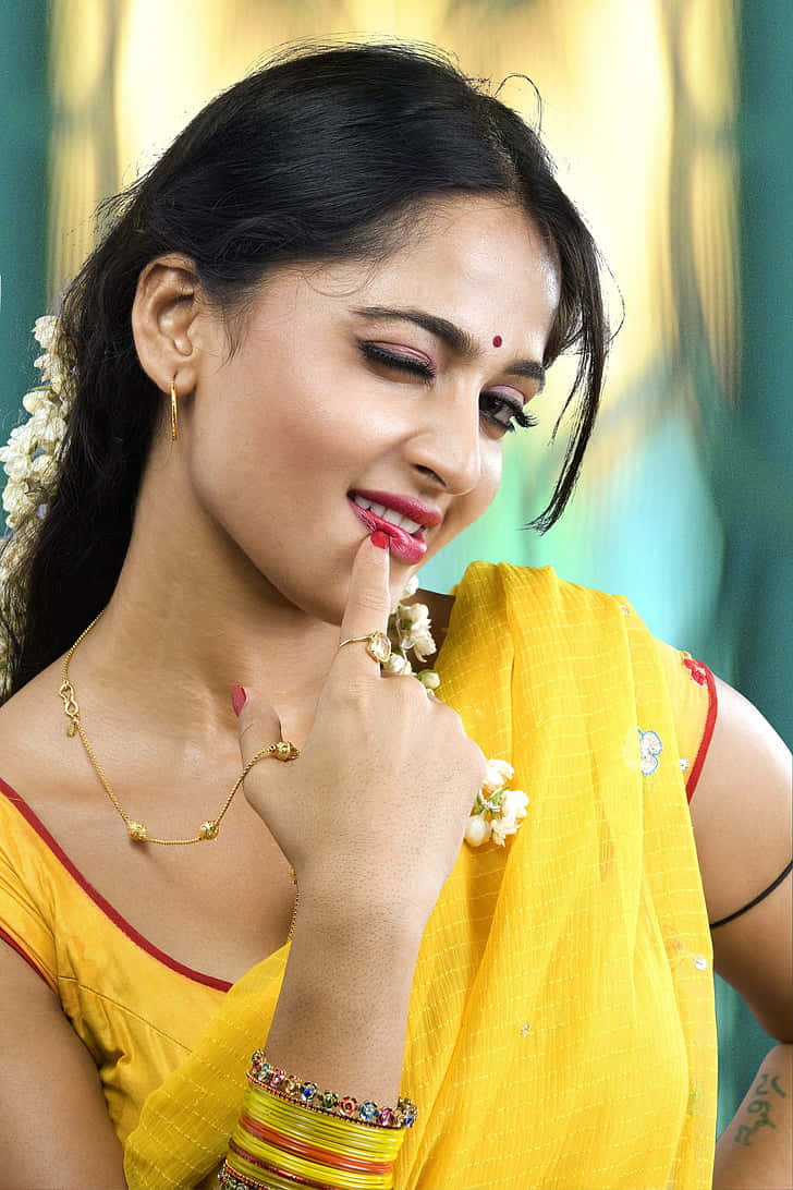 Anushka Shetty Yellow Saree Traditional Look Wallpaper