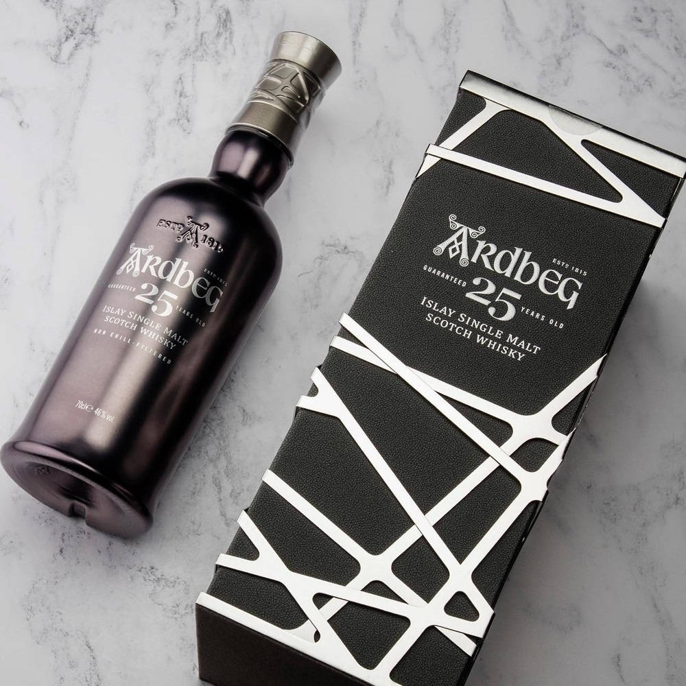 Ardbeg 25 Whisky On A White Marble Wallpaper