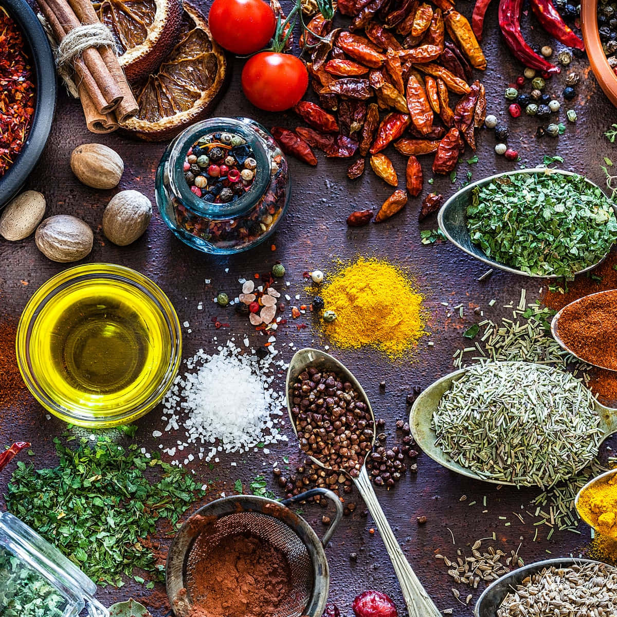 Assorted Herbs And Spices On Table Wallpaper