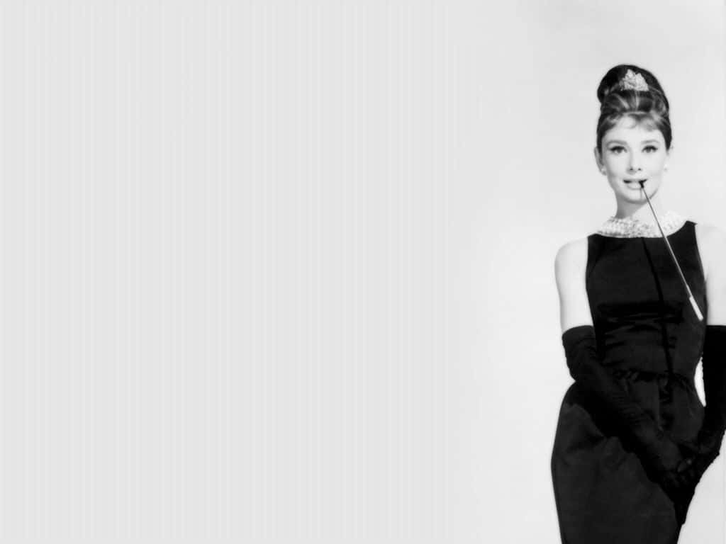 Audrey Hepburn In One Of Her Most Iconic Roles Wallpaper