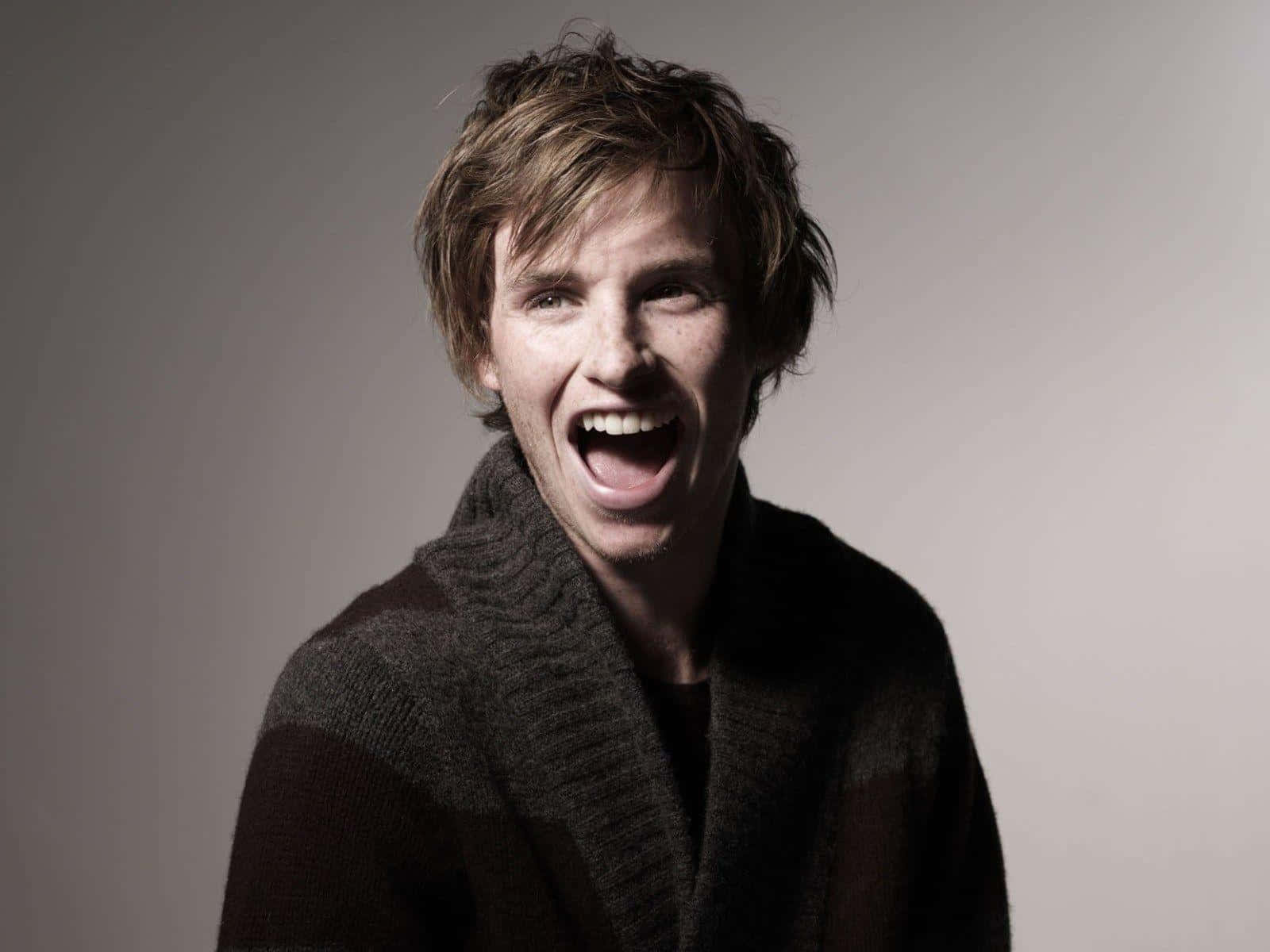 Award-winning Actor Eddie Redmayne Giving An Intense Performance Wallpaper