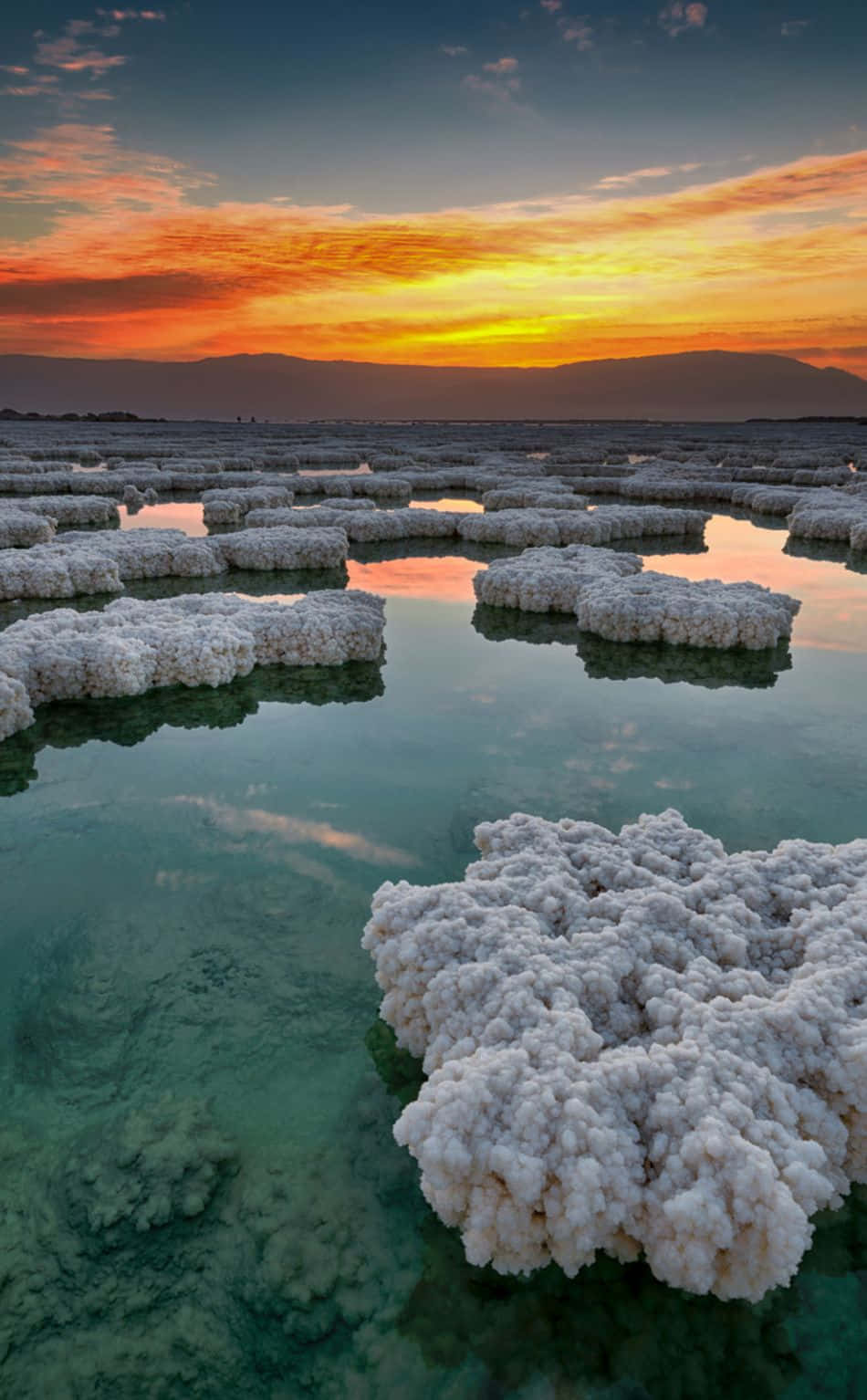 Awe-inspiring View Of Rocky Salt Formations At The Dead Sea Wallpaper