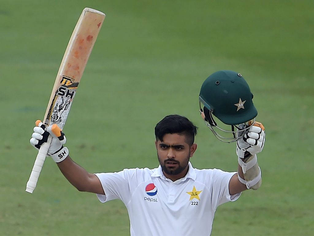 Babar Azam Celebrating With His Cricket Bat Wallpaper